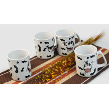 ceramic coffee mug with cow design